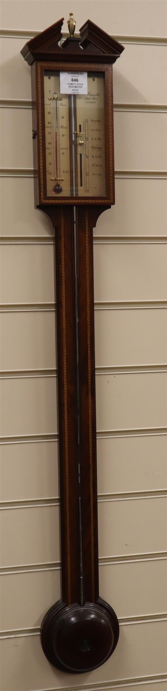 A Georgian style stick barometer by O. Comitti & Son, London, in inlaid mahogany case with silvered scales H.approx. 99cm